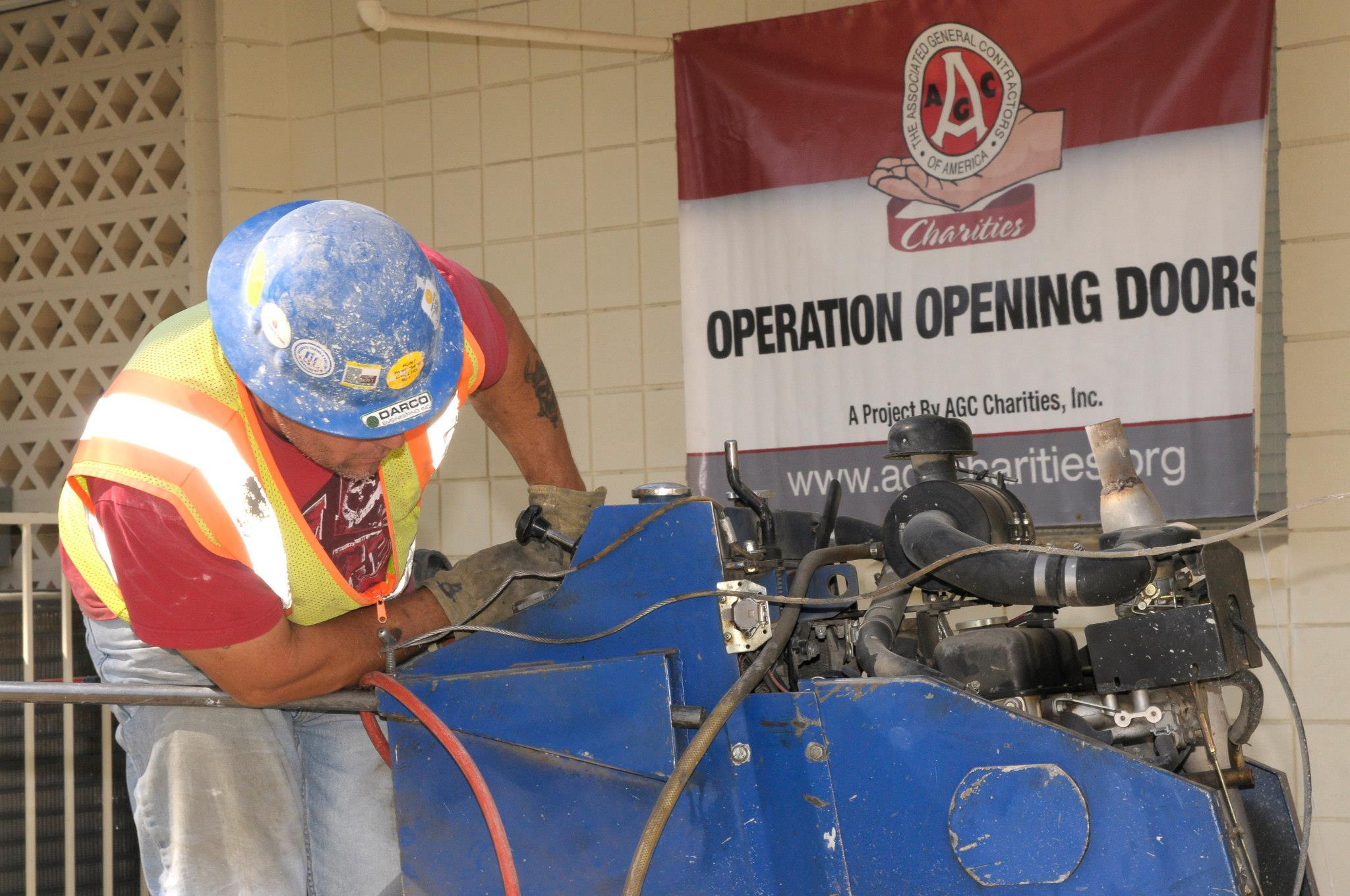 Construction worker working with machine.