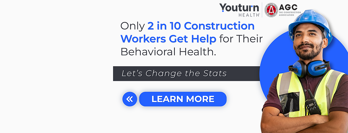 Construction worker with his arms crossed.